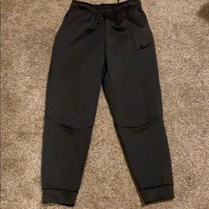NIKE drifit loose fitting joggers dark gray Small